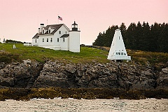 Tenants Harbor Lighthouse With Sun Breaking Through Clouds
